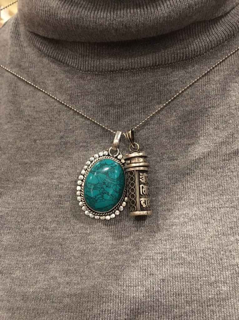 Tibetan turquoise setting and prayer box.